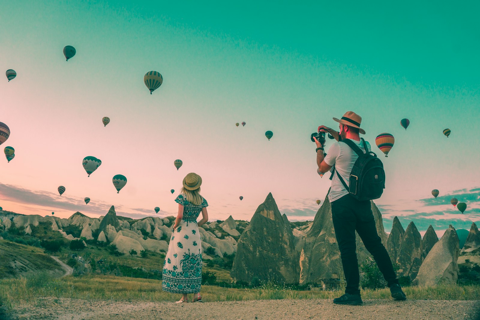 man taking photo of hot air balloons, Mexico Travel